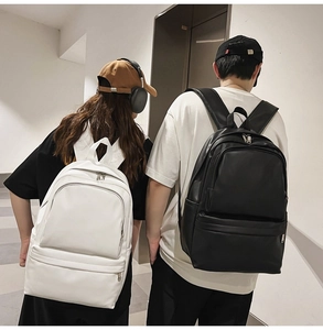 Minimalist leather backpack for students shown in black and white versions on models