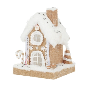 Handcrafted gingerbread house decor with snow roof and festive felt gingerbread patterns