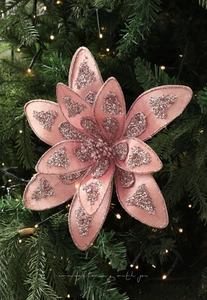 Detail of pink Christmas tree flower ornament with sparkling sequins and mesh layers