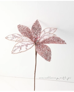 Detail of pink glitter Christmas flower with hollow mesh petals and rhinestone center