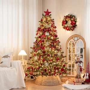 Sapin de Noël de luxe avec nœuds rouges, lumières LED, cloches et jupe d'arbre tressée