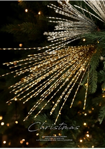 Close-up of sparkling gold and silver glitter spiral stems for Christmas tree decoration