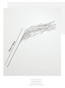 Detail of a 30cm silver glitter tassel branch with shimmering sequins for Christmas decor