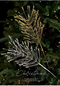 Detailed view of glittering gold and silver artificial branches for Christmas tree decor