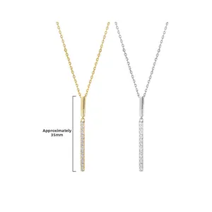 Detail of 35mm sparkling cubic zirconia vertical bar pendant in gold and silver finish