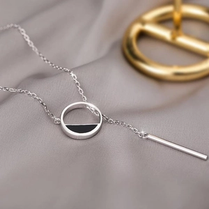 Minimalist S925 sterling silver necklace with black semicircle pendant and bar on silk