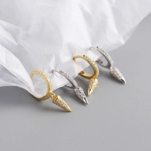 Detailed view of S925 silver hoop earrings with shimmering pave-set conical drops