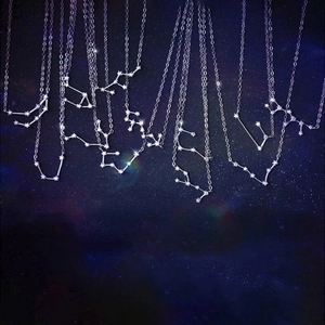 S925 silver constellation necklaces with sparkling diamonds over a starry sky background