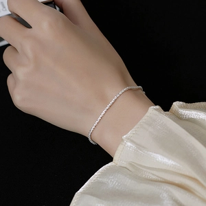 Elegant 925 sterling silver shimmering star chain bracelet for women on model wrist