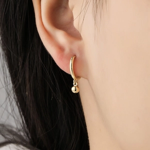 Minimalist S925 sterling silver hoop earrings with gold bead pendant on model