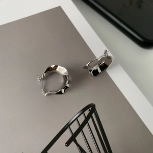 Minimalist S925 sterling silver irregular wave earrings with liquid metal polished finish