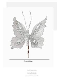 Detail view of a 17cm silver glitter butterfly clip with sequins and faux gems for decor