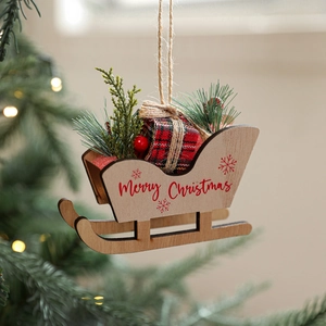 Wooden Christmas sleigh hanging ornament with pine needles and red plaid gift box