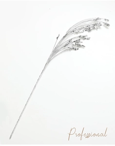 Detailed view of a silver decorative branch with glitter finish for Christmas tree decor
