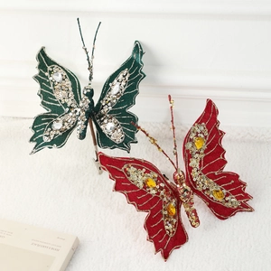 Sparkling butterfly Christmas tree ornaments with glitter and pearls in red and green