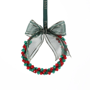 Christmas wreath ornament with red and green crystal beads and dark green ribbon bow