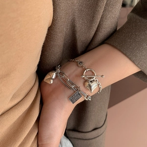 Retro silver heart bracelet with toggle clasp and engraved metal tag for women