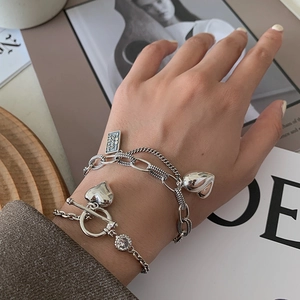 Retro multi-layer silver heart bracelet set with T-bar clasp and engraved charms