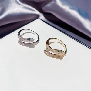 925 silver snake wrap ring with sparkling zircon stones and green gem eyes in gold and silver