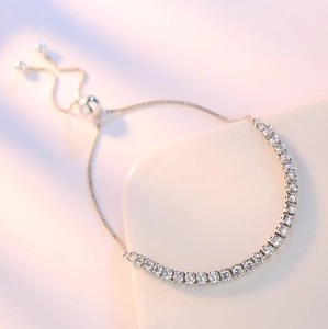 Adjustable S925 silver tennis bracelet with sparkling zircon stones and round bead detail