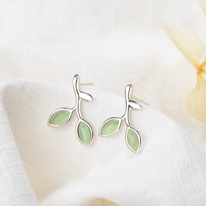 Fresh leaf stud earrings with light green opal stones and polished silver finish