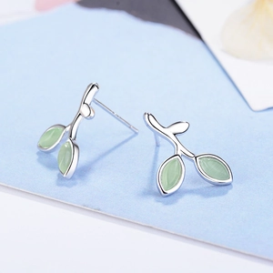 Elegant silver sprout stud earrings with pale green cat eye stone leaf pendants
