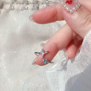 Detail of adjustable open ring featuring crystal letter Y and sparkling round zircon