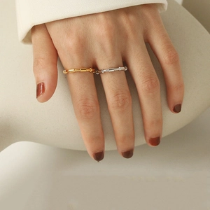 Minimalist gold and silver bamboo joint rings set displayed on female fingers