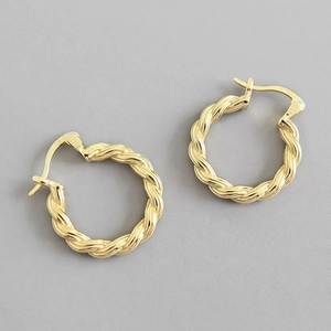 Macro shot showing S925 hallmark on 18K gold plated twisted rope hoop earrings