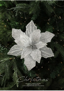 Detail of silver glitter artificial poinsettia flower for Christmas tree decoration