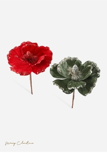 Detail of flocked velvet Christmas flowers with glitter edges in red and green colors
