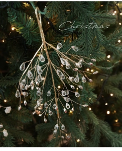 Detail of Christmas tree pick with crystal droplets and gold metal wire branches