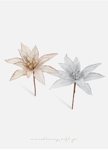 Close-up of artificial poinsettia flowers in champagne and silver with glitter finish