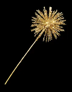 Macro shot of glittery gold firework star pick for Christmas tree floral arrangements