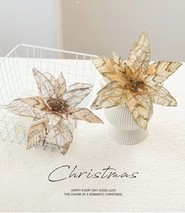 Close-up of 28cm champagne gold Christmas poinsettia flowers with glitter and bead detail