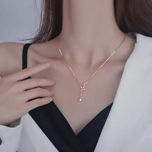 Elegant gold Big Dipper necklace for women featuring fine tassels and sparkling star pendants