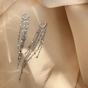 Elegant silver heart earrings with long hanging chain tassels and shiny metal sequins