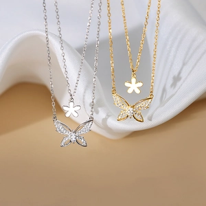 Elegant double-layered butterfly and flower zircon necklace in gold and silver finish
