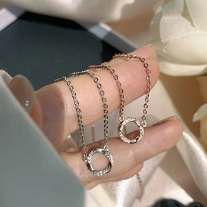 Elegant circle pendant necklaces with micro-pave diamonds in silver and rose gold finishes