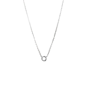 Minimalist silver circle pendant necklace with micro pavé details on a delicate chain