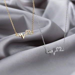 Elegant 925 silver heartbeat necklaces in gold and silver finish with zircon heart pendant