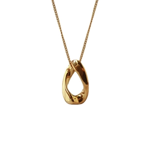 Minimalist gold hollow teardrop pendant necklace with polished finish on fine chain