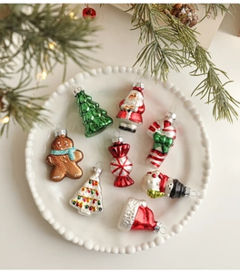 Detailed set of 8 mini Christmas glass ornaments featuring Santa, snowman and trees