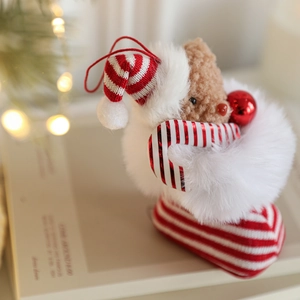 Plush Christmas teddy bear in red and white striped hat and stocking tree ornament