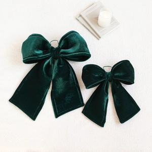 Dark green velvet Christmas bows in large and small sizes for tree decoration