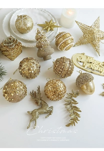 Golden Christmas tree ornaments set with glitter balls, reindeer and pine cones