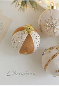 Detail of high-end 8cm brown velvet Christmas ball with gold sequins and lace decor