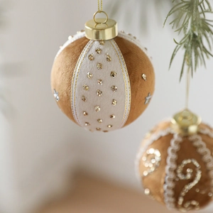 Brown fabric 8cm Christmas ball with golden stars hanging on pine branch