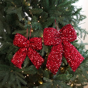 Sparkling red sequin Christmas bow tree ornaments in small and large sizes for holiday decor