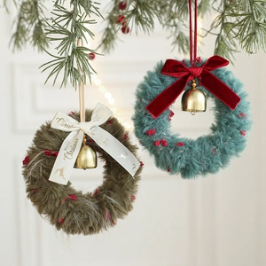 Mini plush Christmas wreaths with velvet bows and bells for festive window decorations
